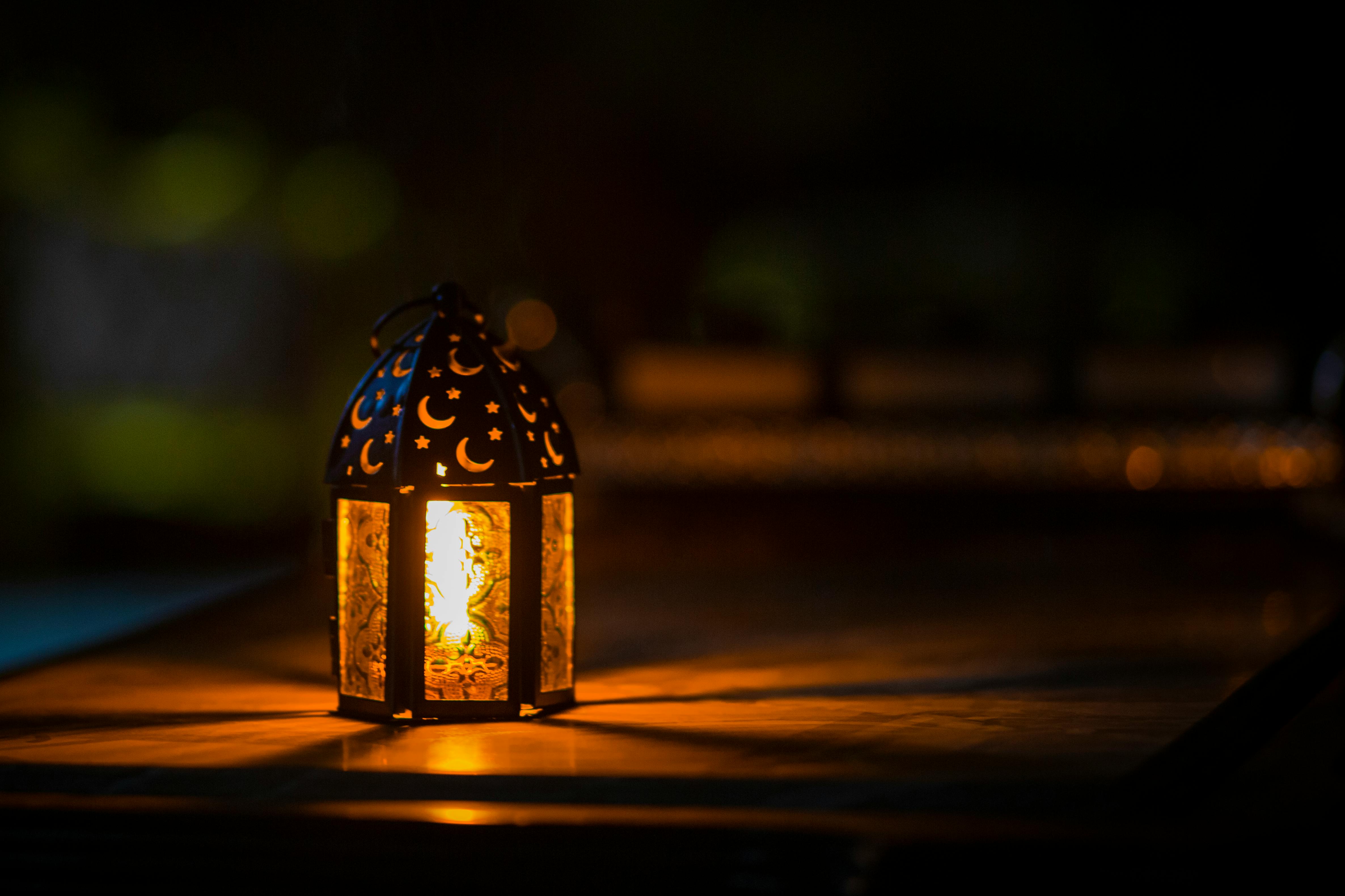 Photo by Ahmed Aqtai from Pexels: https://www.pexels.com/photo/photo-of-ramadan-light-on-top-of-table-2233416/